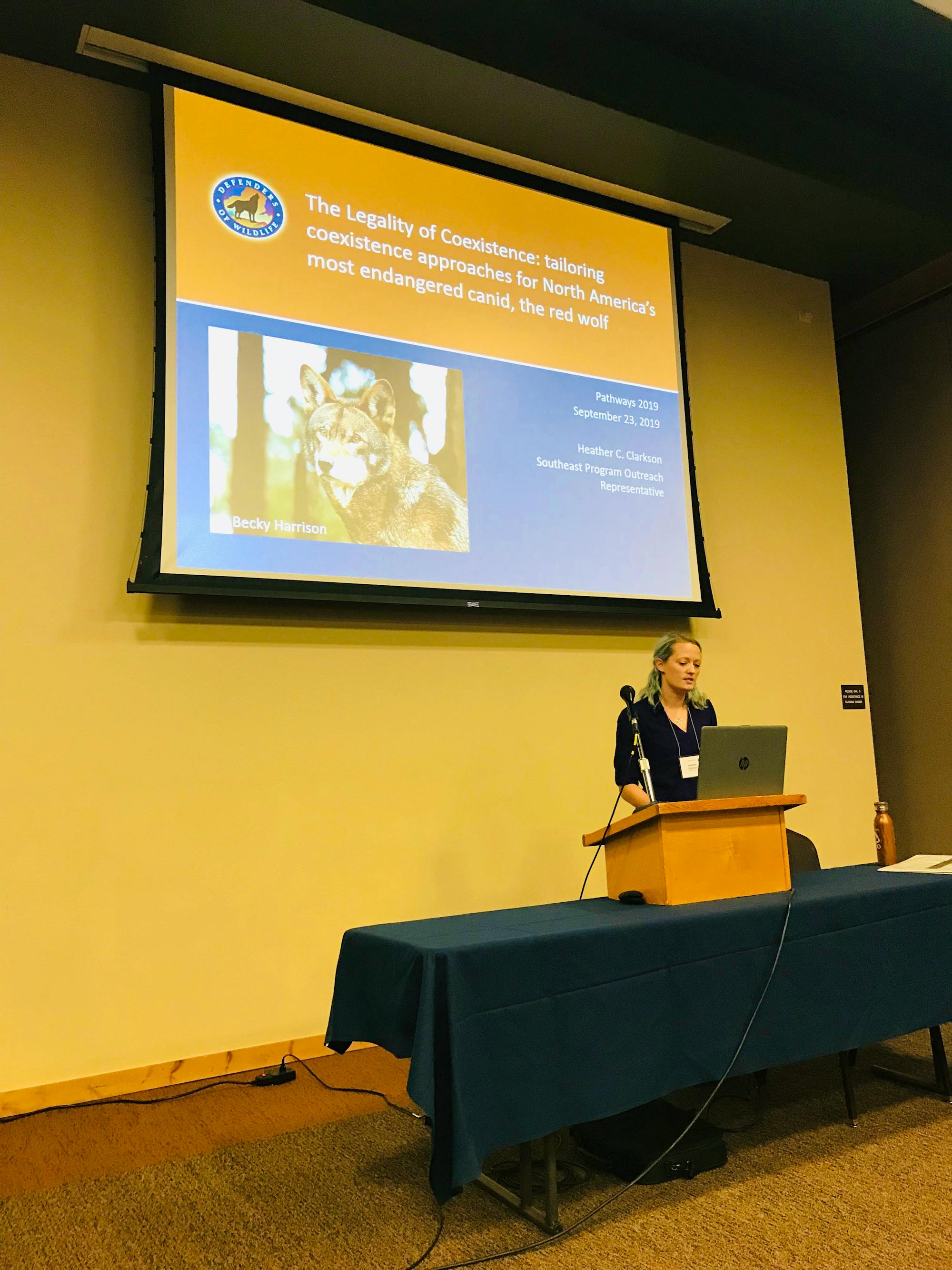 Pathways Conference 2019 Heather Clarkson talking to red wolf